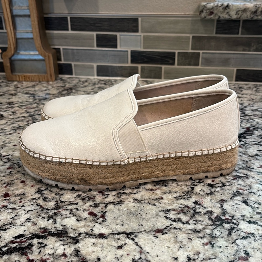 Circus by Sam Edelman’s white platform slip on shoes.  Size 9.